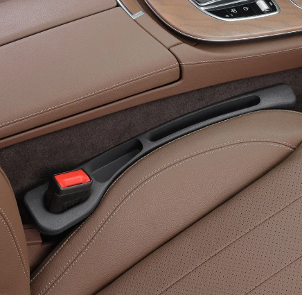 Relleno para espacio entre asientos de auto